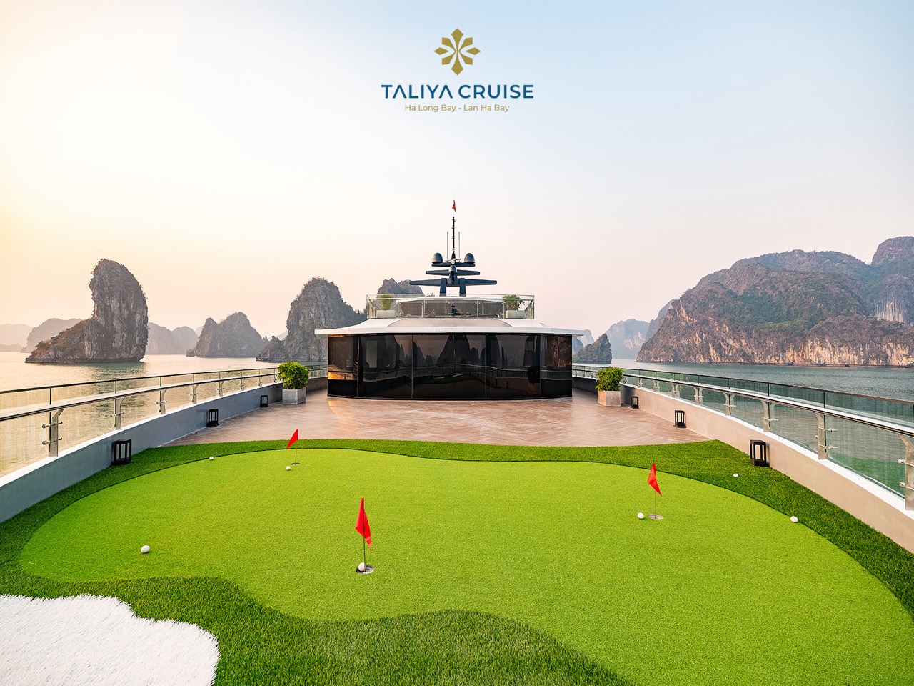 Stunning view from the cruise balcony over Halong Bay's emerald waters and limestone karsts.