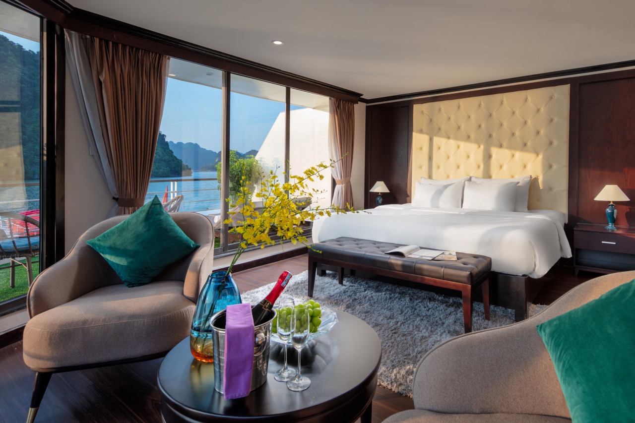 Elegant cruise balcony view of Halong Bay with modern amenities and scenic water vistas.