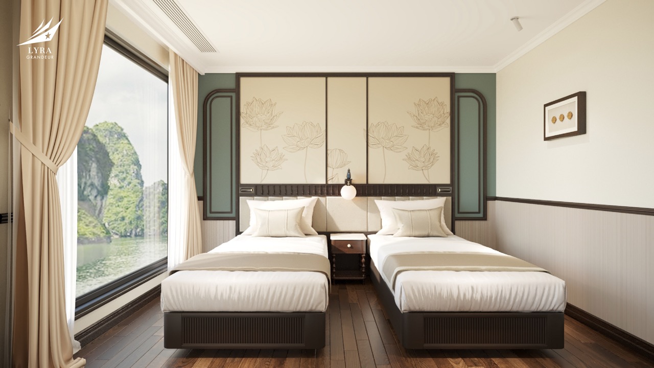 Luxurious hotel room with twin beds overlooking scenic natural landscape.