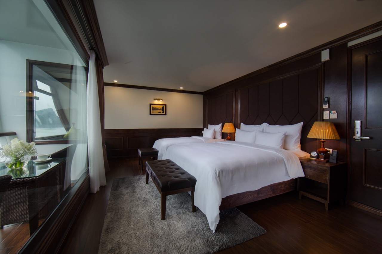 Stunning view from a luxury cruise balcony in Halong Bay, perfect for relaxing and enjoying the scen.