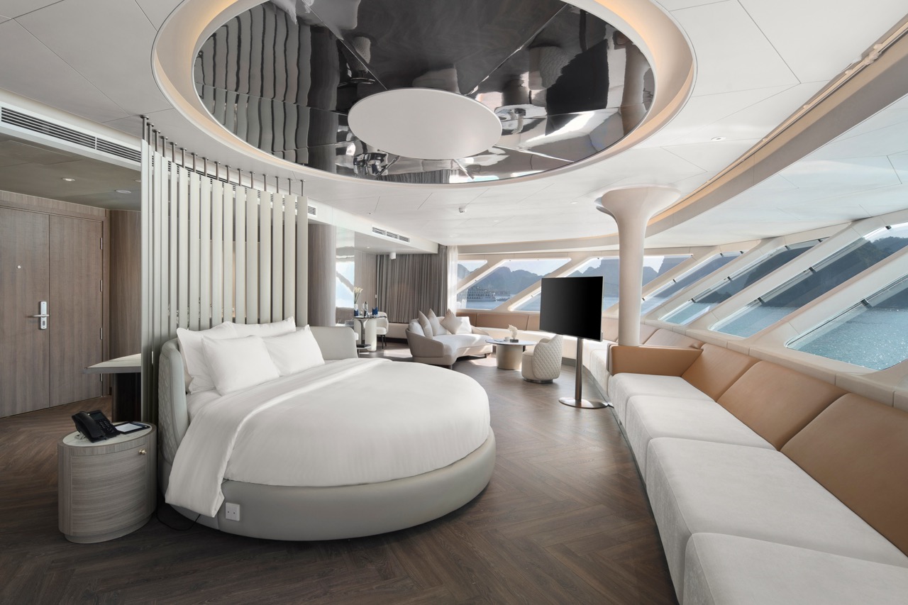 Luxurious cruise ship interior with modern design and panoramic ocean views.