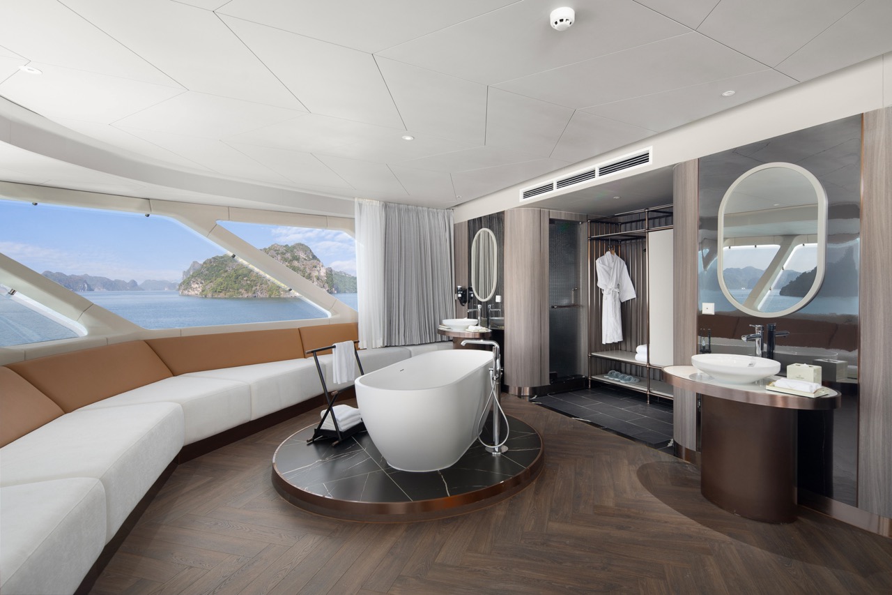 Luxurious yacht bathroom with ocean view, modern bathtub, and contemporary amenities.
