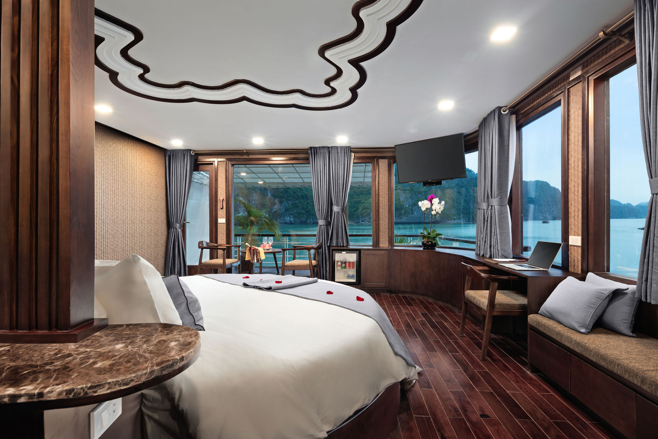 Luxury hotel room with river view, elegant interior, and modern amenities.