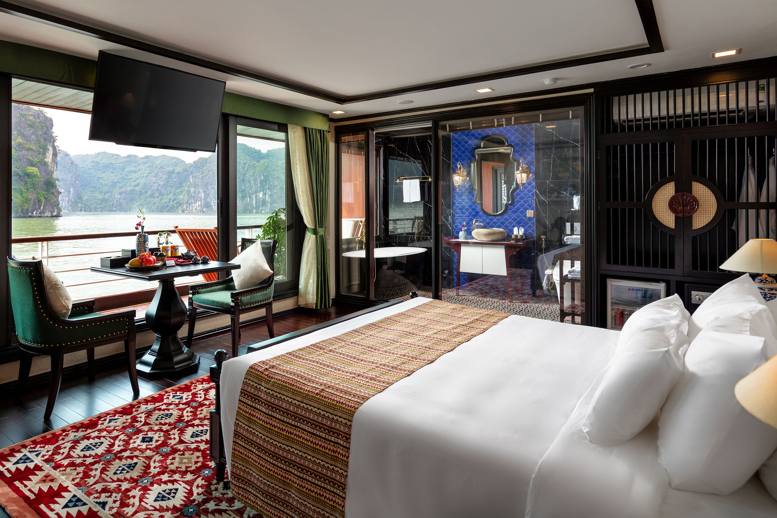 Luxurious hotel room with river view, modern amenities, and elegant decor for a premium travel experience.
