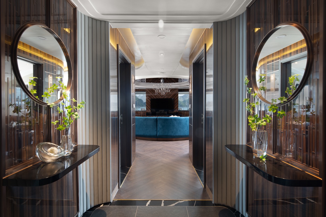 Luxurious hotel hallway with modern design, elegant wood accents, and stylish decor.