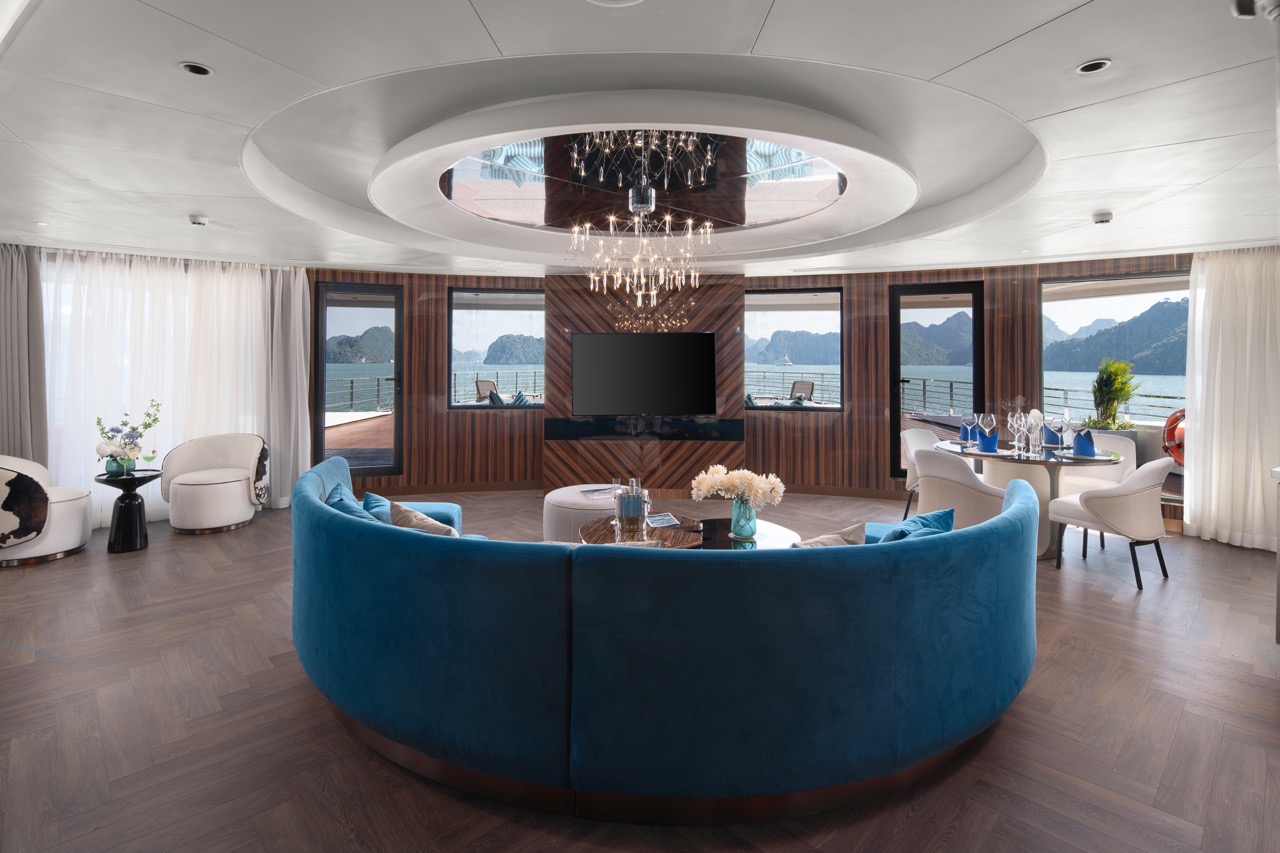 Luxurious yacht lounge with panoramic sea views and modern interior design.