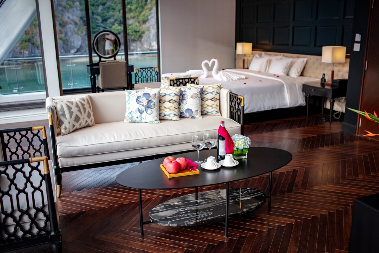 Luxury hotel suite with king-size bed, scenic views, and elegant decor for a memorable stay.
