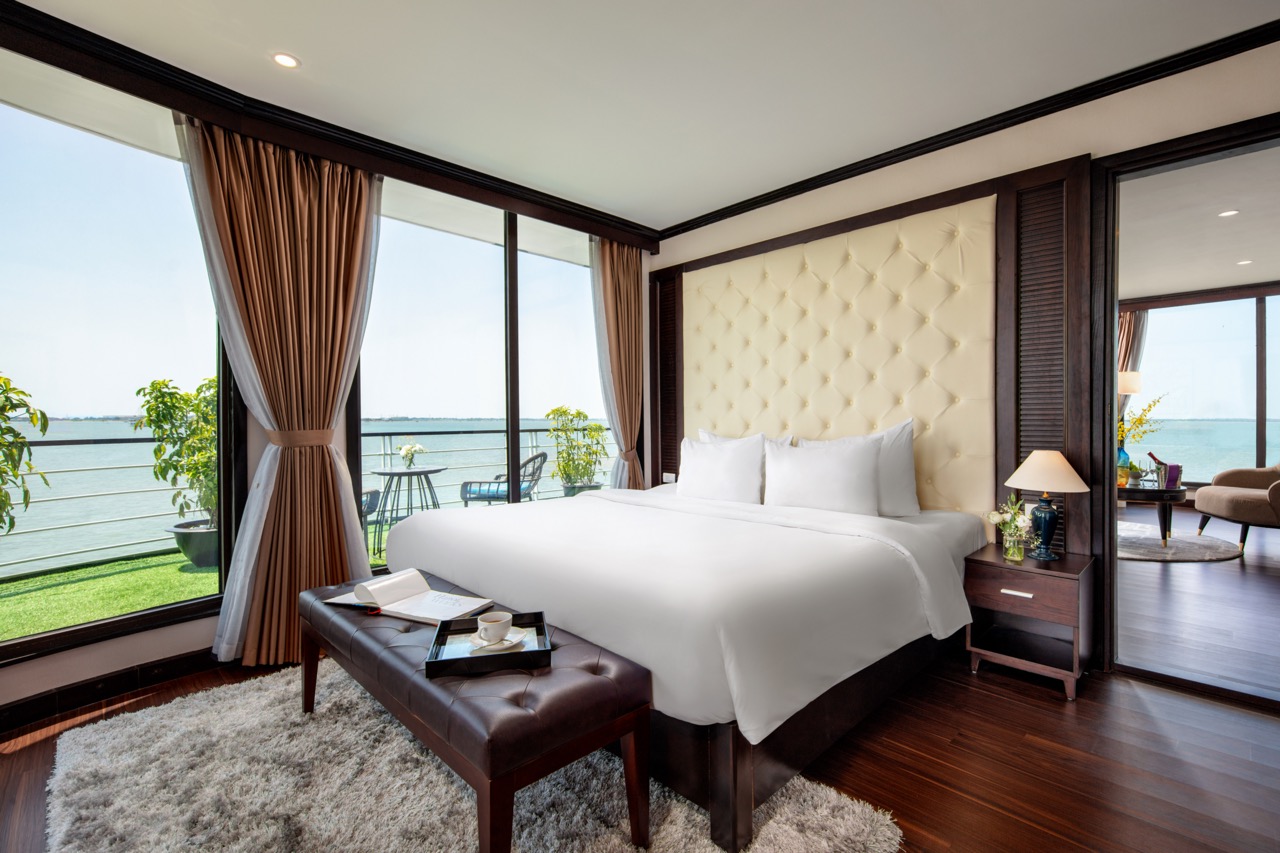 Stunning cruise balcony view of Halong Bay with elegant interior, perfect for a romantic getaway or.