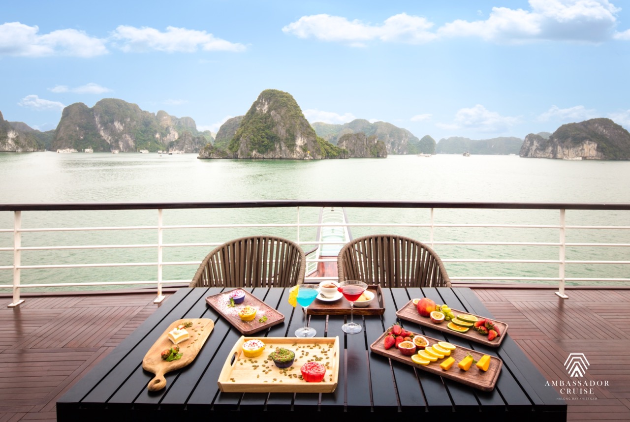 Stunning view of Halong Bay's limestone karsts from a cruise balcony, perfect for a memorable travel.