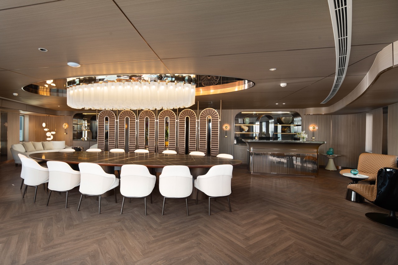 Elegant modern dining room with luxurious ambiance and stylish furniture.