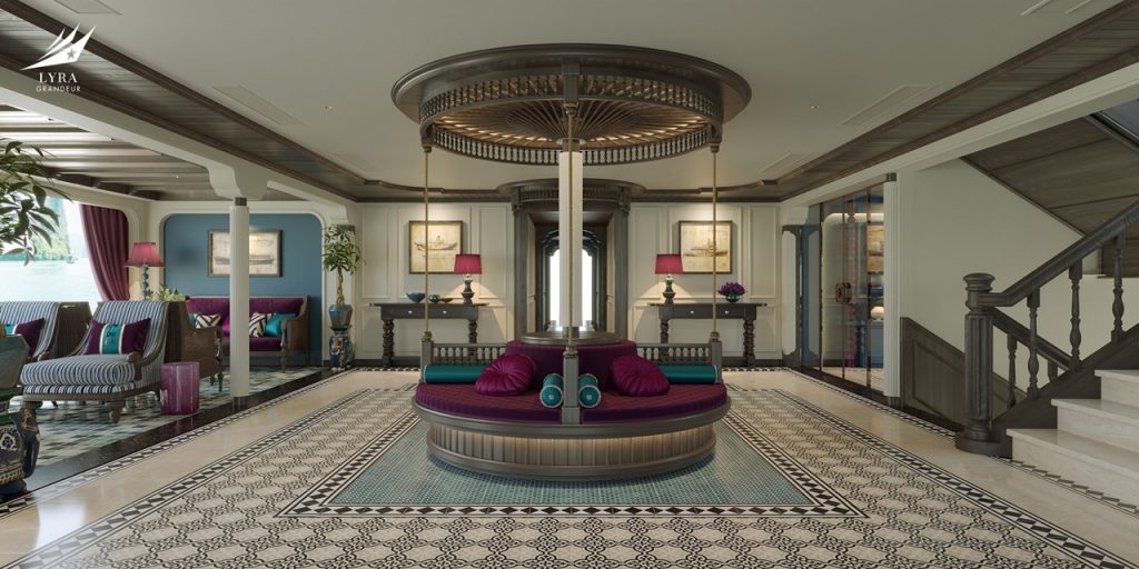 Luxurious hotel lobby with elegant decor and seating, showcasing high-end interior design.