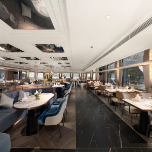 restaurant-window-seating-view-grand-pioneers-cruise-halong-bay-viettrendtour