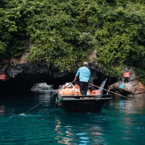 sampan-cave-entrance-dark-bright-cave-lan-ha-bay-viettrendtour