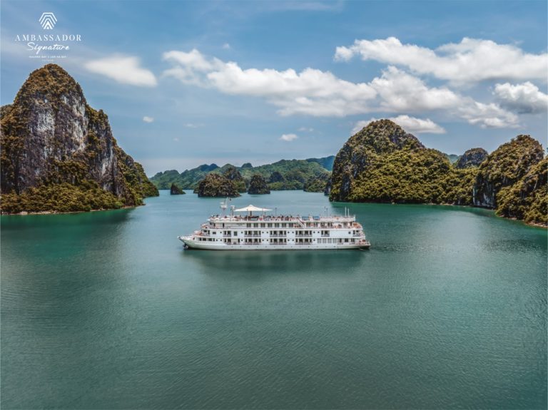 Scenic Halong Bay cruise with limestone islands and tranquil waters, perfect for exploring on a boat.