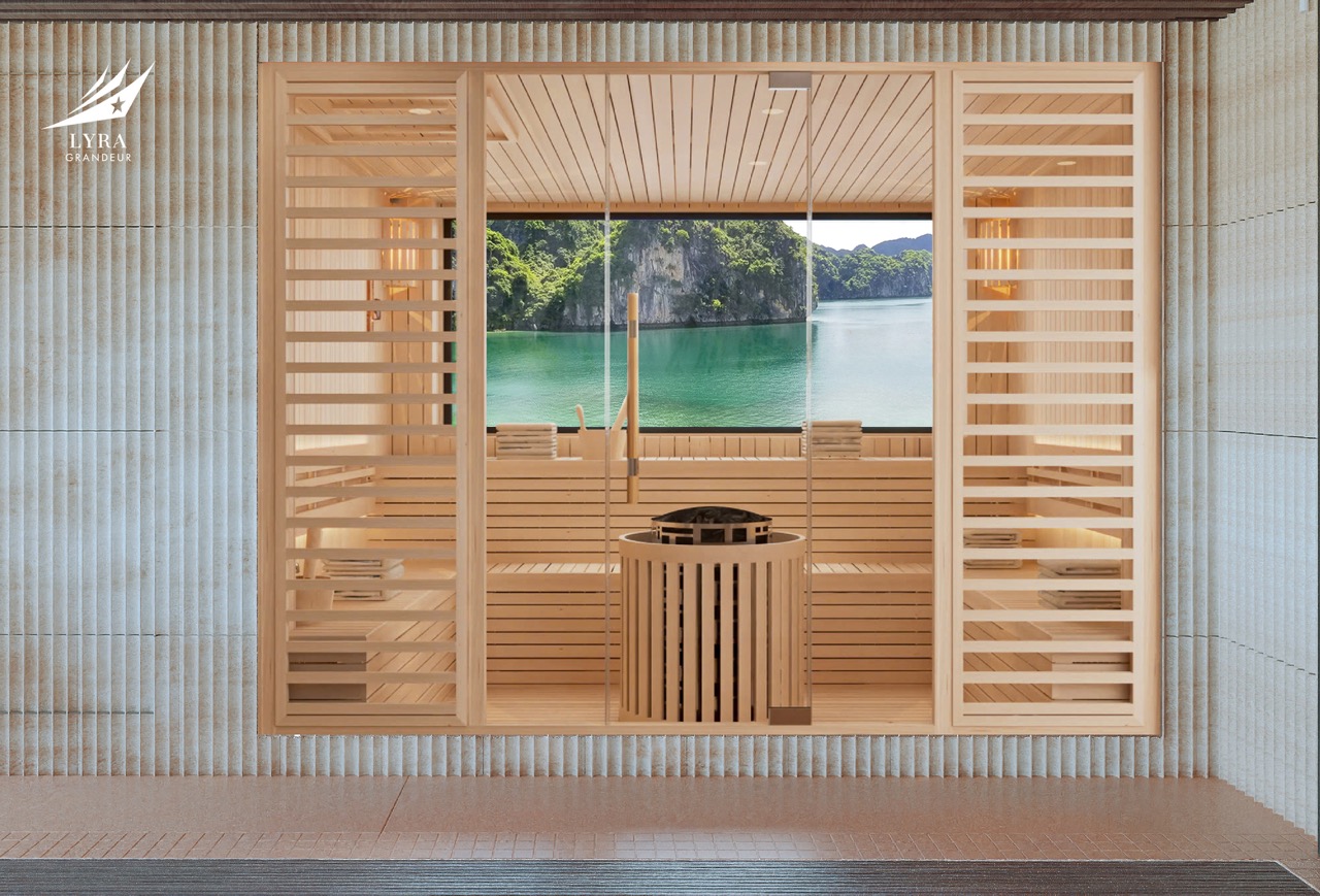 Relaxing wooden sauna with scenic water view and lush greenery in the background.