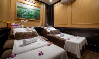 Luxurious cruise balcony view of Halong Bay with serene waters and scenic landscape.