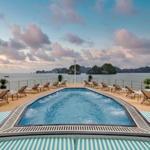 Relaxing pool deck with ocean view and island scenery in Vietnam.