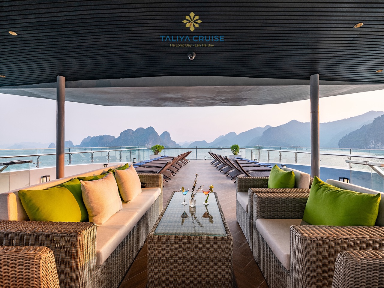 Luxurious cruise balcony overlooking Lan Ha Bay, perfect for relaxing and enjoying stunning seascape.