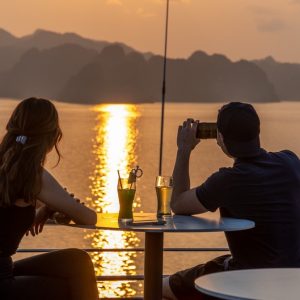 sundeck-sunset-cocktail-views-grand-pioneers-cruise-halong-bay-viettrendtour