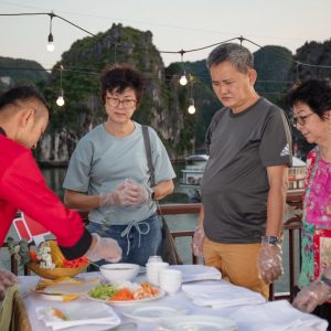 sundeck-vietnamese-cooking-class-guests-amanda-halong-cruise-halong-bay-viettrendtour