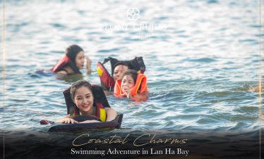 Beautiful women enjoying kayaking on Halong Bay during sunset, scenic and relaxing travel experience.