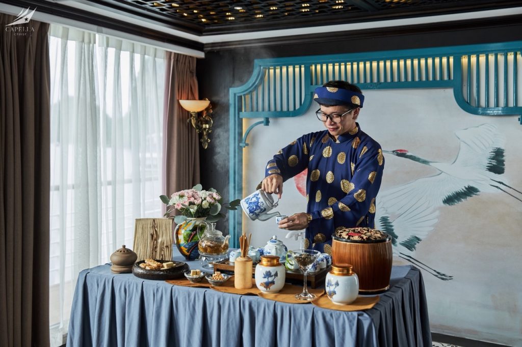 Colorful traditional tea ceremony in Vietnam with vibrant décor and elegant presentation.