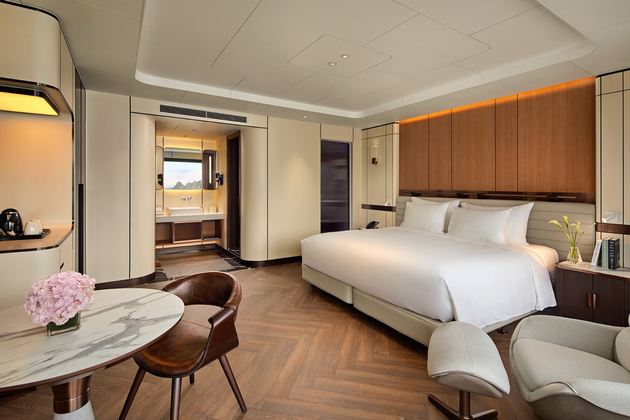 Luxurious hotel suite with modern decor and city view, perfect for a premium travel experience.