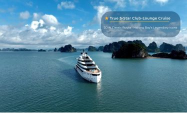 Luxury yacht cruising in Halong Bay with limestone islands, part of Vietnam's iconic UNESCO World Heritage site.