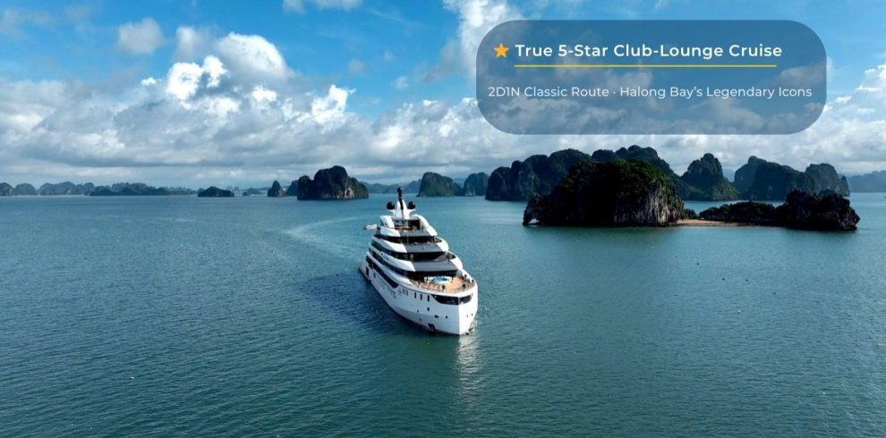 Luxury yacht cruising in Halong Bay with limestone islands, part of Vietnam's iconic UNESCO World Heritage site.