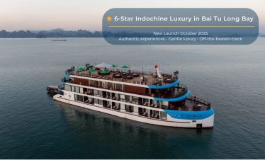 Elegant cruise balcony view over Halong Bay with scenic limestone karsts and tranquil waters.