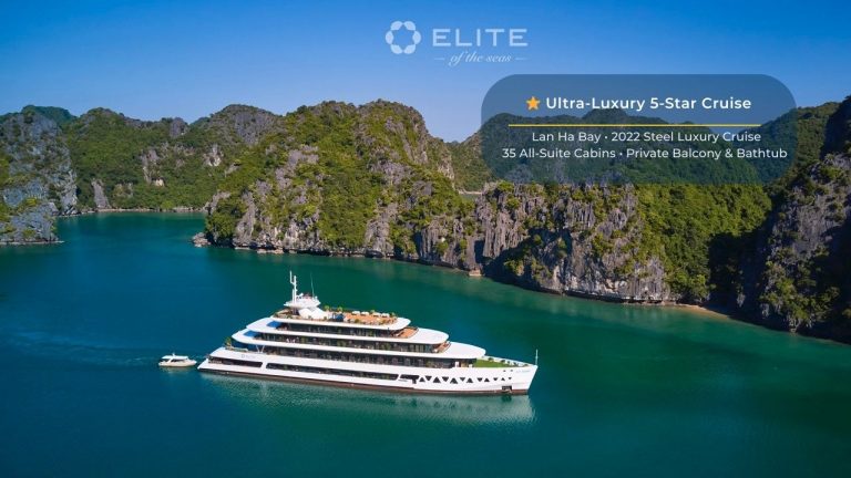 Stunning view of a modern cruise ship sailing through emerald waters surrounded by towering limeston.