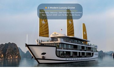 Elegant cruise ship sailing through Lan Ha Bay with stunning limestone karsts in the background.