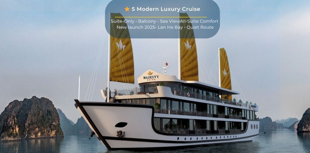 Elegant cruise ship sailing through Lan Ha Bay with stunning limestone karsts in the background.