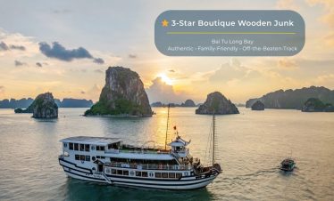 Beautiful Bai Tu Long Bay scenery with cruise boat at sunset, showcasing tranquil waters and stunnin.