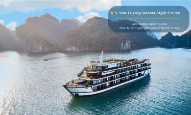Elegant cruise sailing through Halong Bay's stunning limestone karsts.