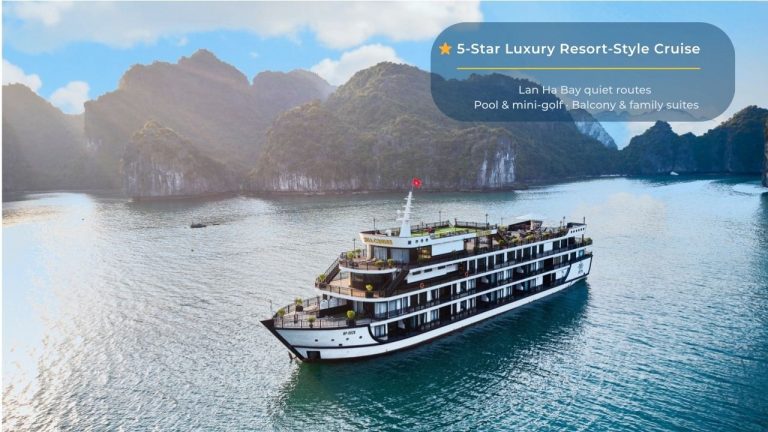 Elegant cruise sailing through Halong Bay's stunning limestone karsts.