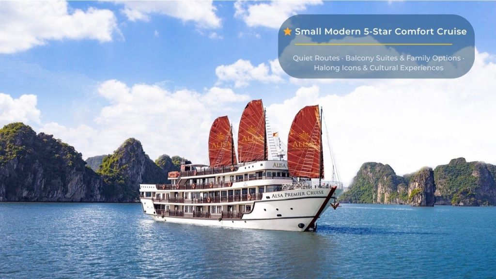 Elegant cruise ship sailing through stunning Halong Bay with towering limestone karsts and emerald w.