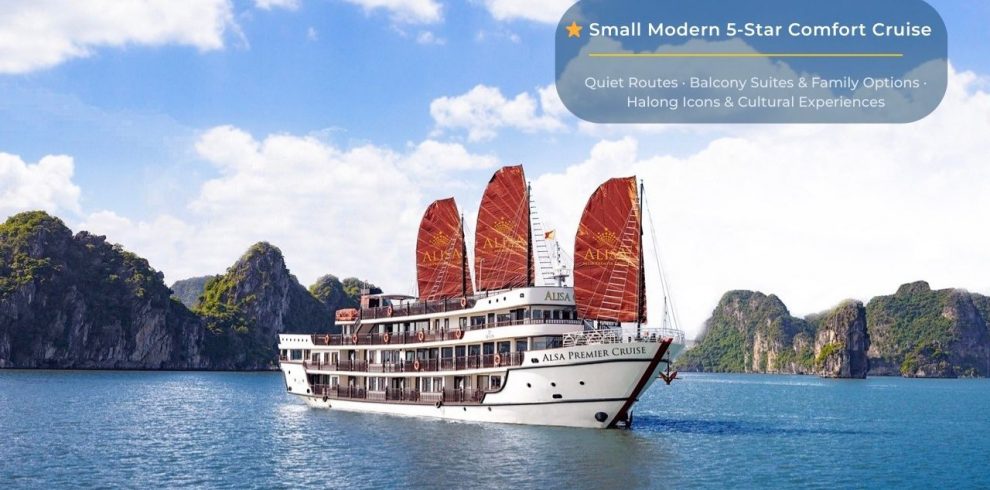 Elegant cruise ship sailing through stunning Halong Bay with towering limestone karsts and emerald w.