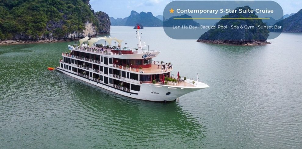 Luxury cruise ship on Lan Ha Bay with scenic limestone islands in Vietnam.