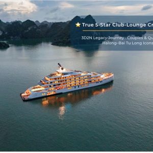 Luxury cruise boat in Halong Bay at sunset, offering 5-star yacht tours and scenic island visits.