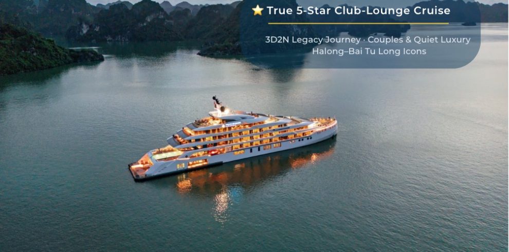 Luxury cruise boat in Halong Bay at sunset, offering 5-star yacht tours and scenic island visits.