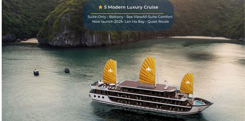 Elegant cruise ship sailing through Lan Ha Bay's tranquil waters, showcasing luxury and scenic beaut.