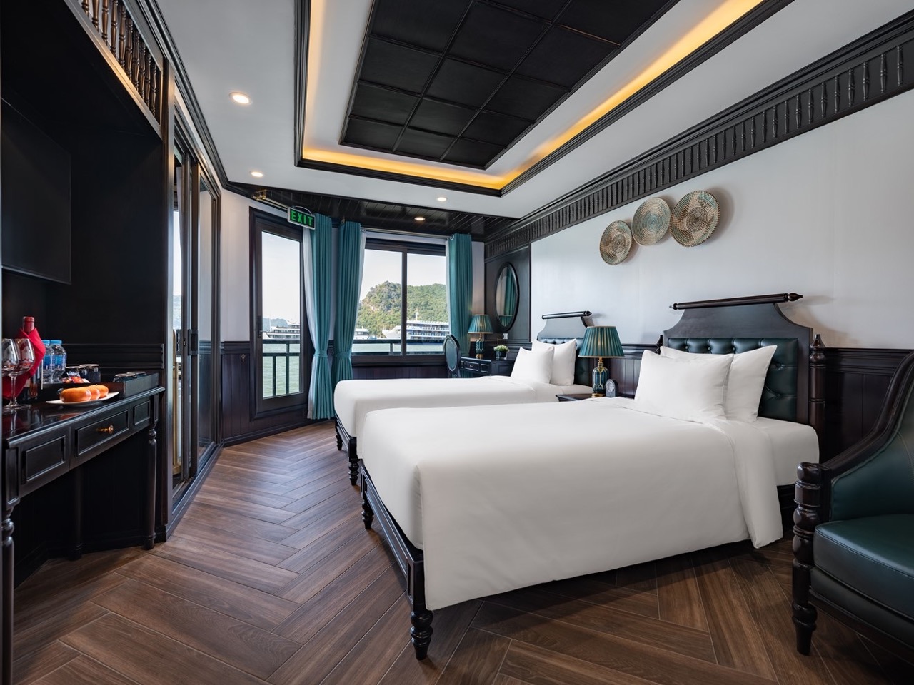 Stunning view from a luxury cruise balcony in Halong Bay, perfect for relaxing and sightseeing.
