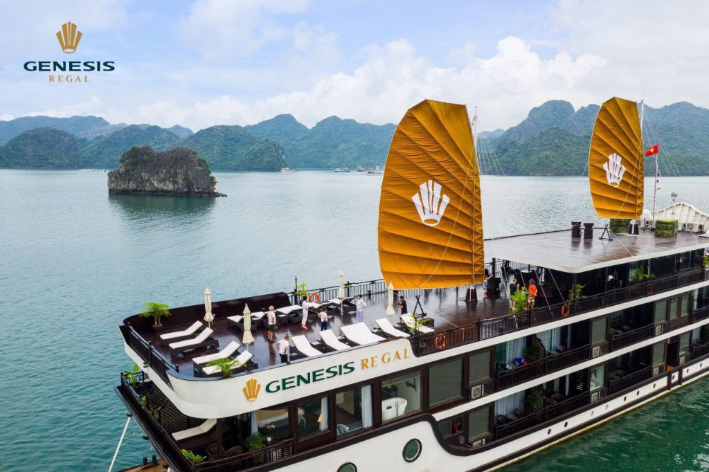 Stunning view of Halong Bay from cruise balcony with limestone islands and calm waters.