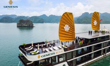 Stunning view of Halong Bay from cruise balcony with limestone islands and calm waters.
