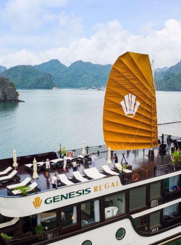 Stunning view of Halong Bay from cruise balcony with limestone islands and calm waters.