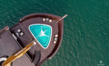 Stunning view of Halong Bay from cruise balcony with private pool, perfect for relaxing and enjoying.