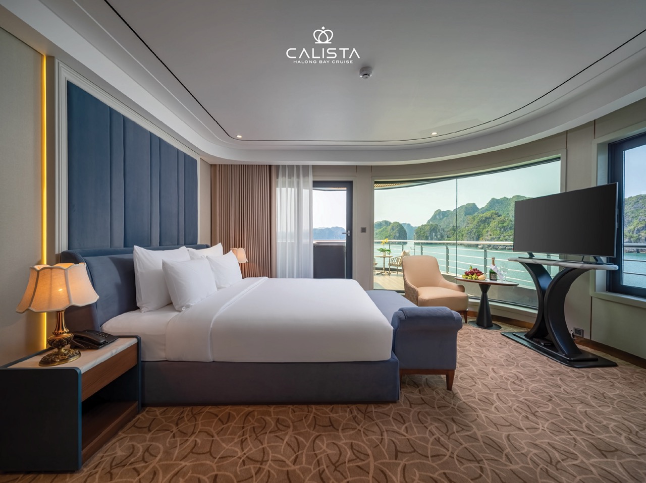 Elegant cruise balcony view of Halong Bay with modern amenities and scenic landscape.