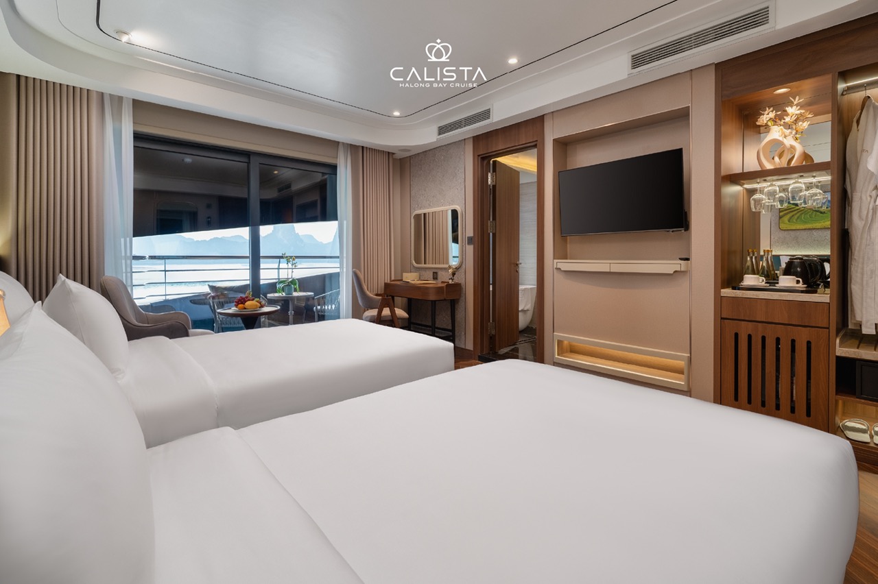 Luxurious cruise cabin with stunning bay views in Halong Bay.