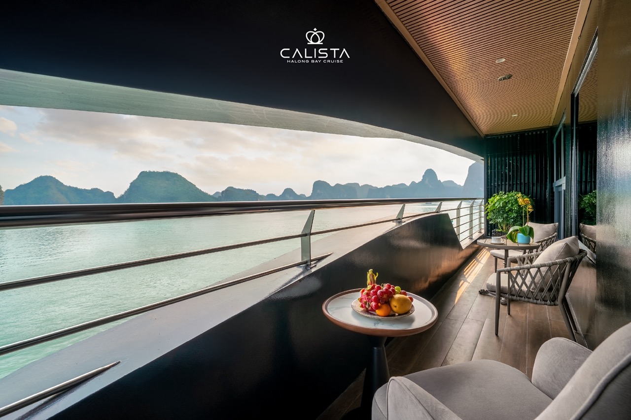 Beautiful Halong Bay cruise balcony with panoramic views, perfect for relaxing and enjoying the scen.